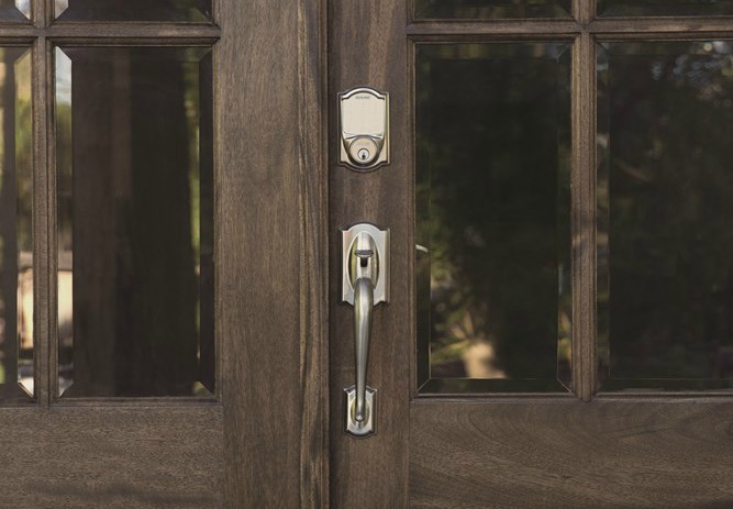 Exterior French door with Schlage Sense smart lock and Schlage Camelot front entry handle.