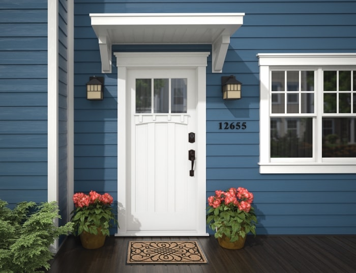 White front door with Schlage Connect Smart Deadbolt.