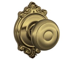 Georgian knob with Brookshire trim in Antique Brass
