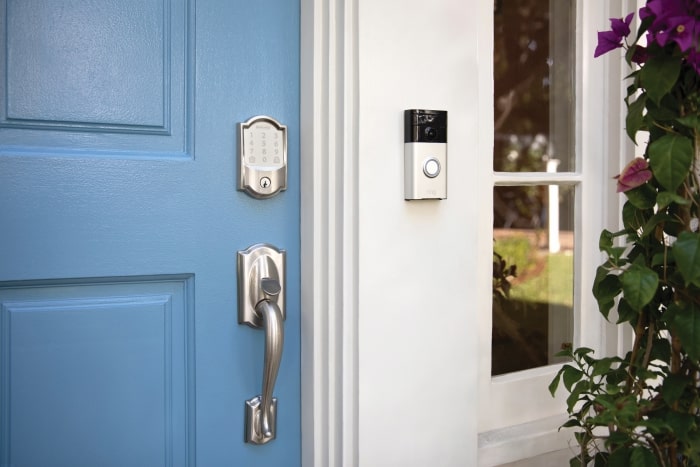 Schlage Encode smart wifi deadbolt on front door with Ring video doorbell.