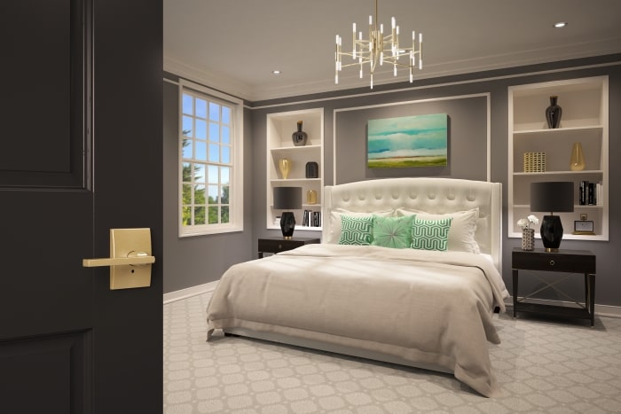Glamorous master bedroom with satin brass Schlage Latitude lever.