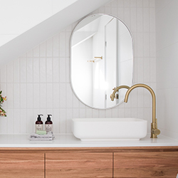 Designing for durability: Choosing hardware and finishes for bathroom.