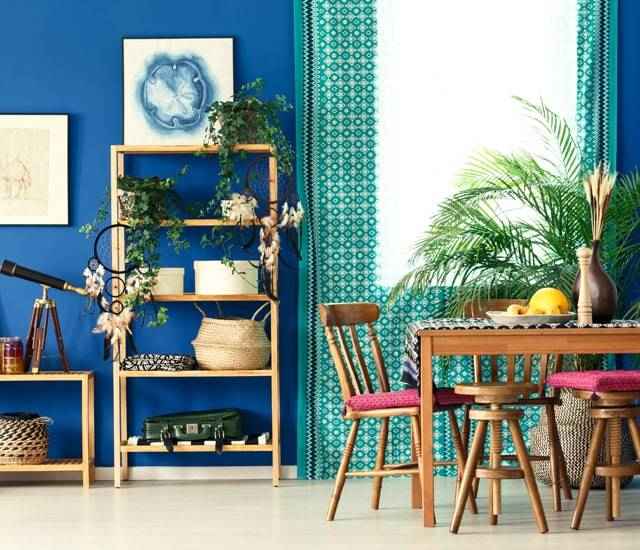 Bohemian modern dining room with bright colors.