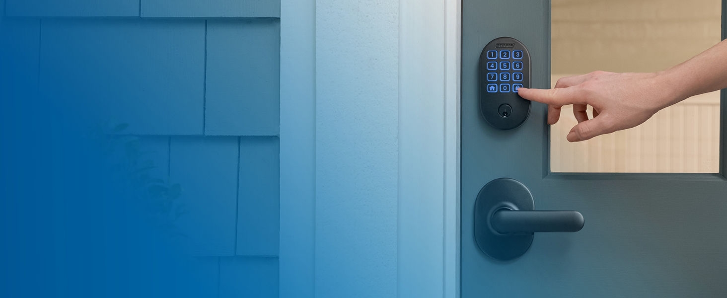 Hand pushing Schlage Arrive smart lock buttons