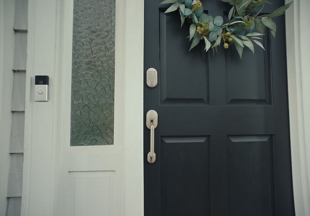 Front door with Schlage Arrive smart lock paired with a ring video doorbell.