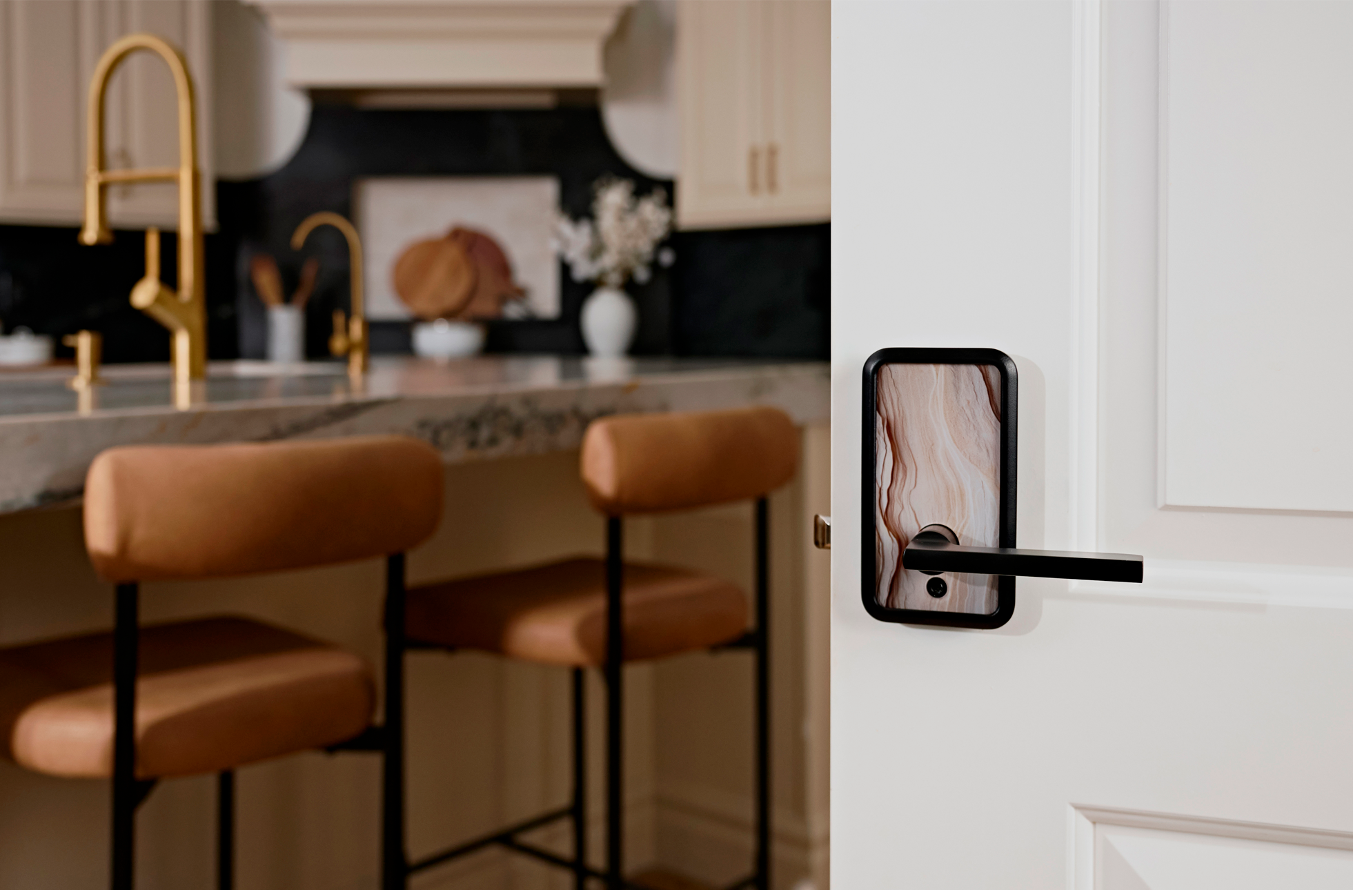 Close up of unique door lever on kitchen door.