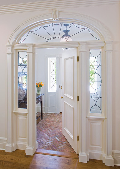Traditional entryway with brick floor