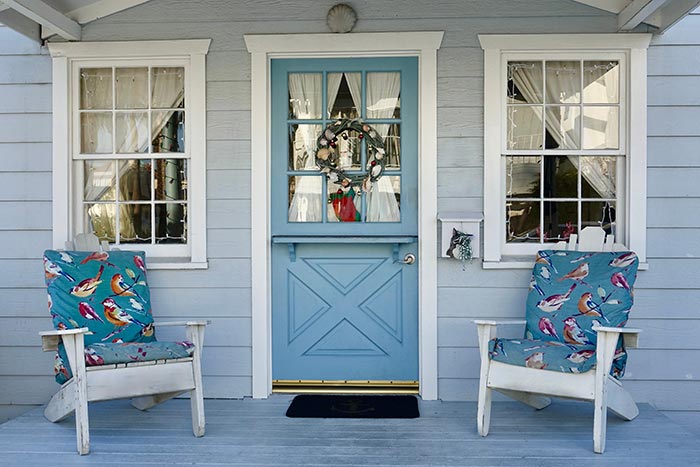 Coastal home with blue dutch door