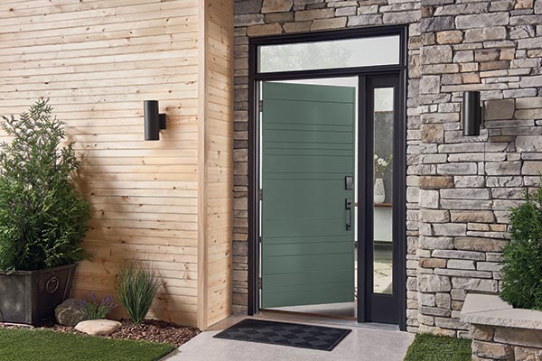 Schlage Encode wifi deadbotl in matte black on green front door.