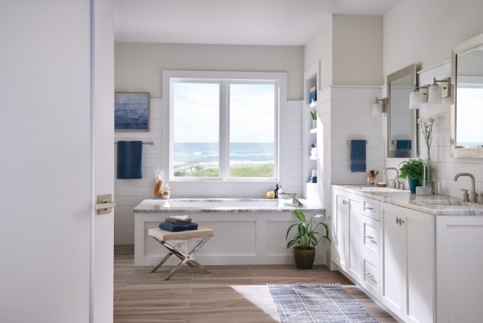 Modern bathroom with Schlage Custom lever and beach view.