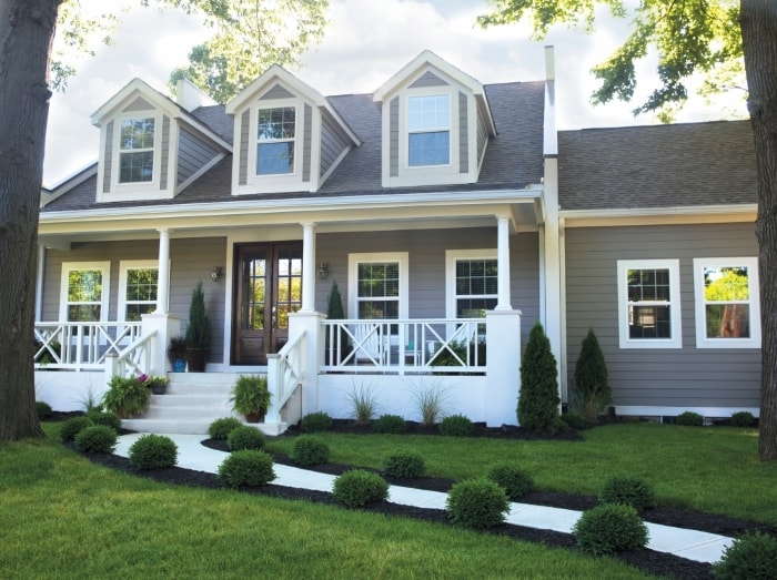 Colonial style home with large front porch and walkway