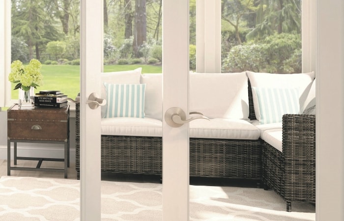 French doors leading to sunroom with Schlage Accent levers in Satin Nickel
