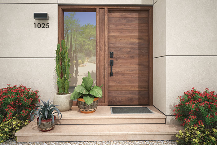 Schlage Connect Smart Deadbolt in matte black on modern wood front door.