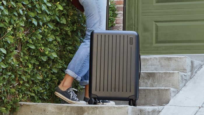 Grey and black hard shell luggage