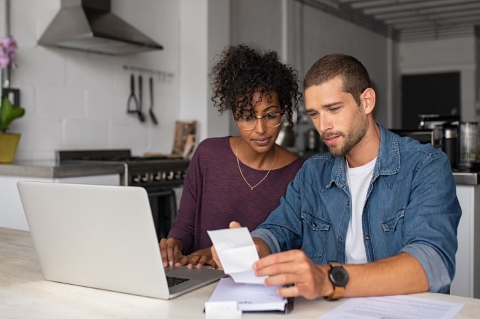 Couple working on home finances.