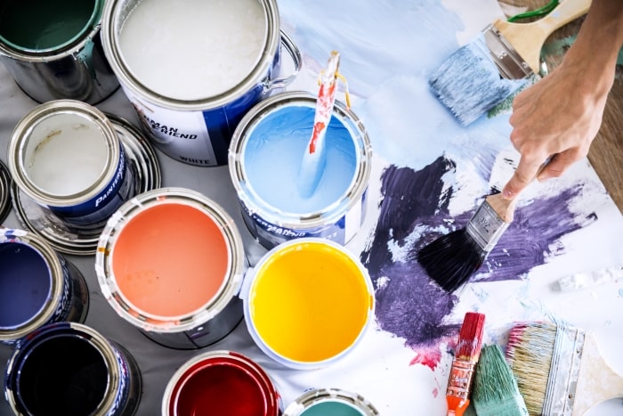 Leftover paint cans and brushes.