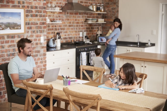 Happy family in kitchen.