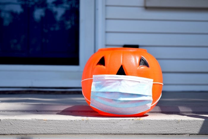 Pumpkin bucket with mask.