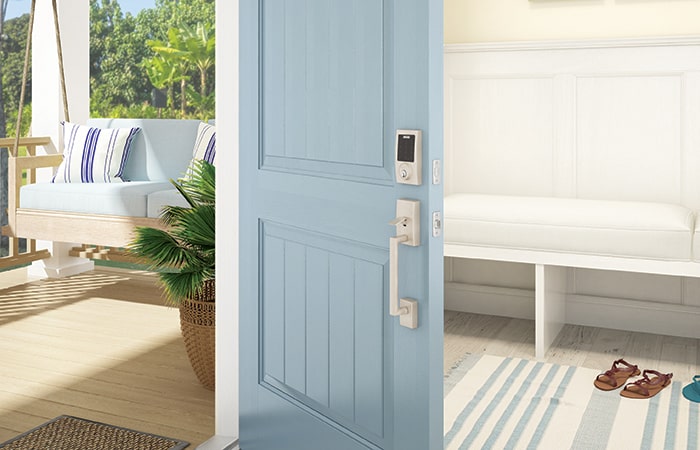 Schlage Connect Smart Deadbolt on blue front door.