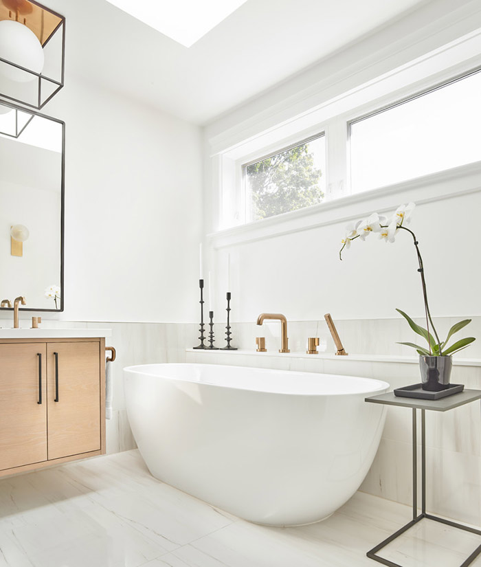 White Scandinavian bathroom with orchid