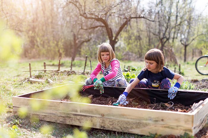 Children planting community garden