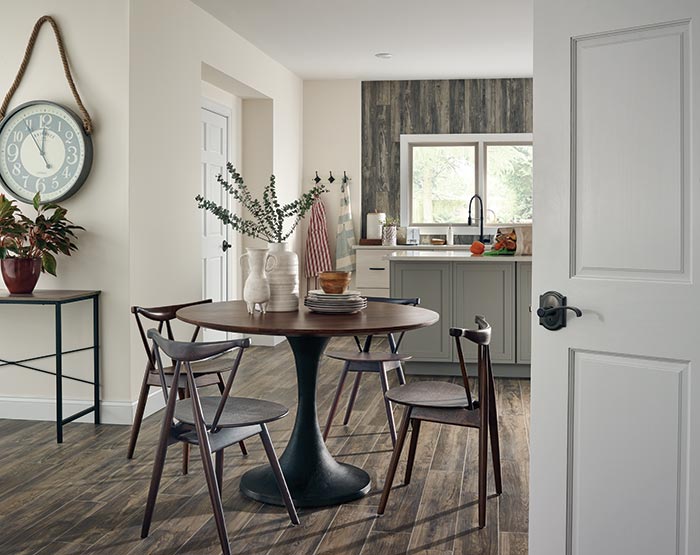 Farmhouse kitchen with Schlage Custom Whitney lever in Aged Bronze finish.