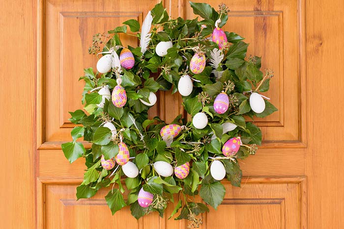 Green wreath with Easter eggs.