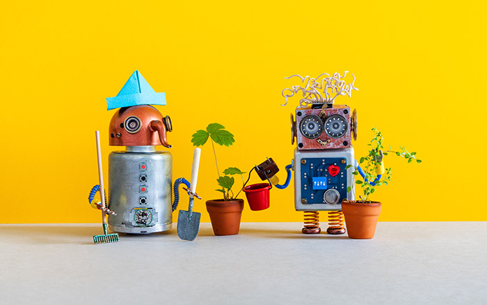 Cute robots with house plants.