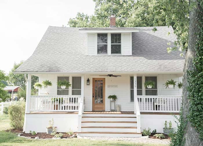 Farmhouse on Boone front porch remodel after