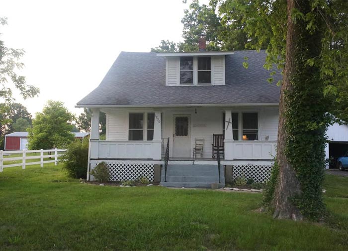 Farmhouse on Boone front porch remodel before