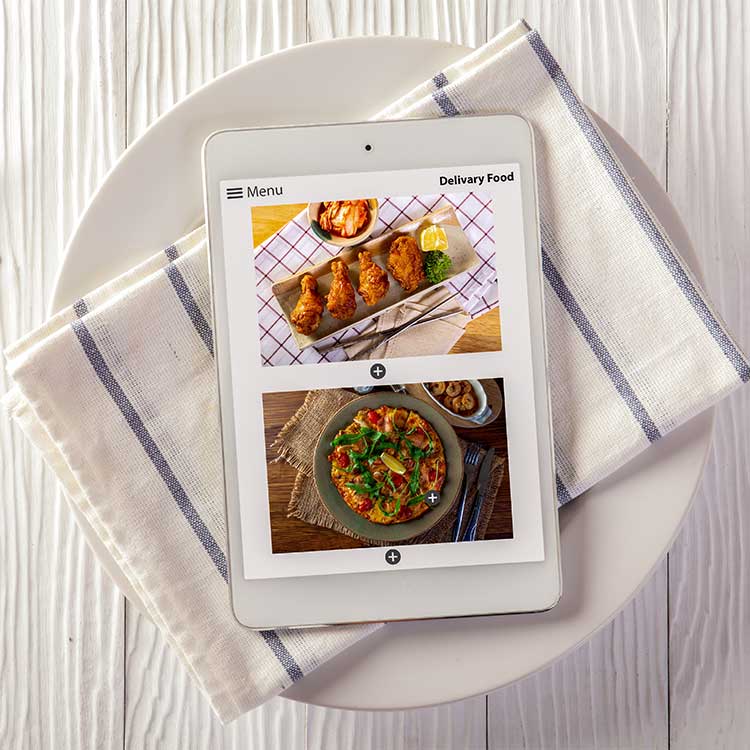 Meal delivery service on tablet screen.
