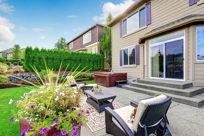 Suburban backyard with tall trees for privacy