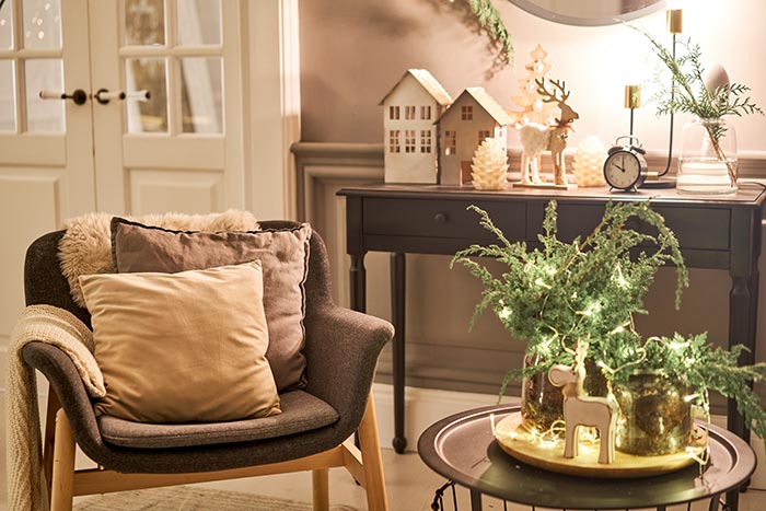 Cozy living room with neutral holiday decor.