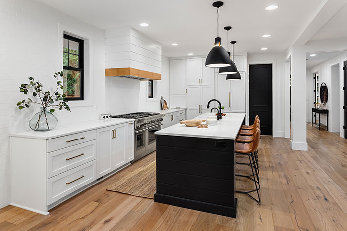 Farmhouse kitchen with mixed hardware finishes.