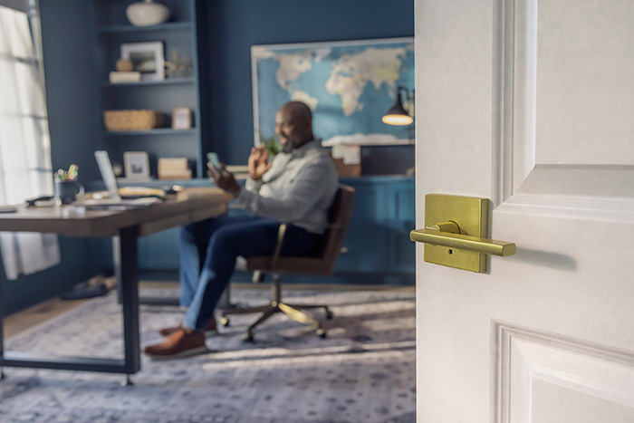 Schlage Satin brass gold handle on office door.