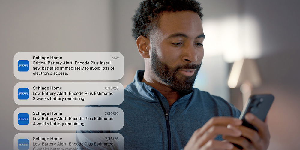 Person being notified of their smart lock's battery life.