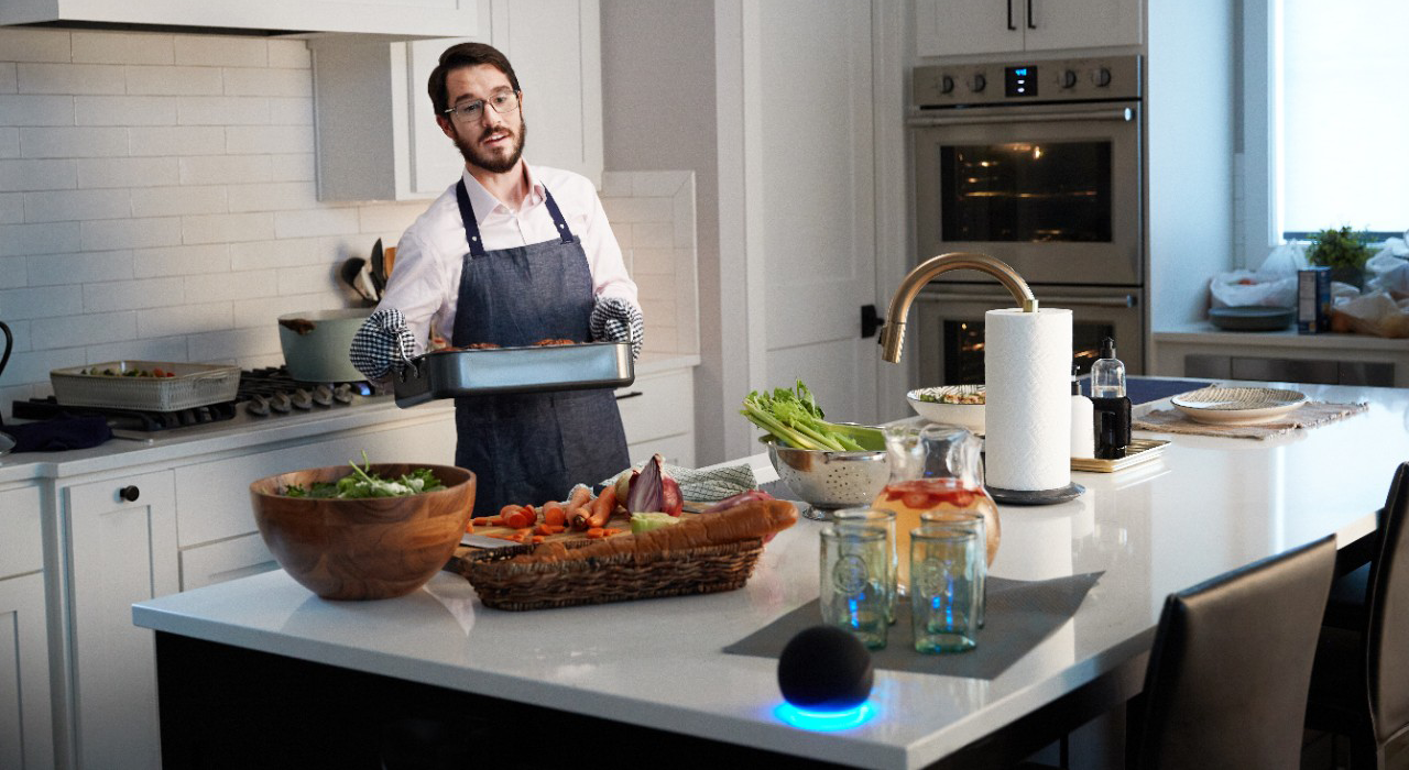 Man cooking unlocks his door with Alexa