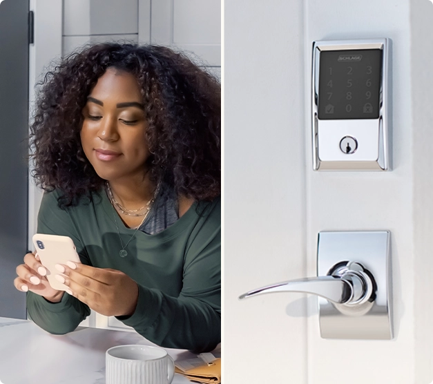 Woman looking at smart phone next to Schlage smart door lock. 