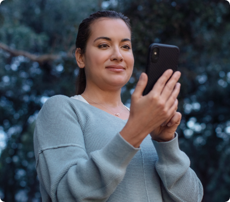 person looking at smart phone