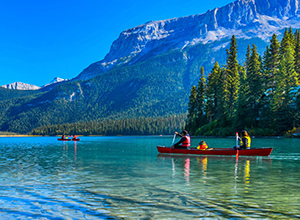 Family canoeing on Emerald Lake