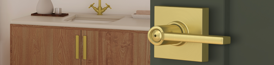 Schlage satin brass lever on bathroom door
