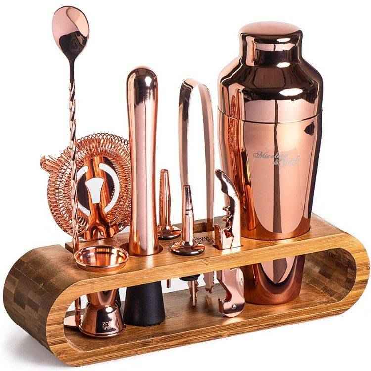 Copper mixology bartender set with bamboo stand.