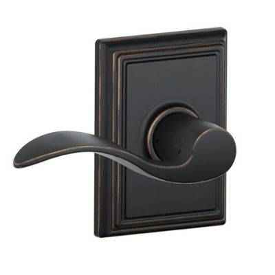 Door handle with aged bronze finish.